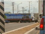 Ferromex C30-S7 Locomotive crossing the street